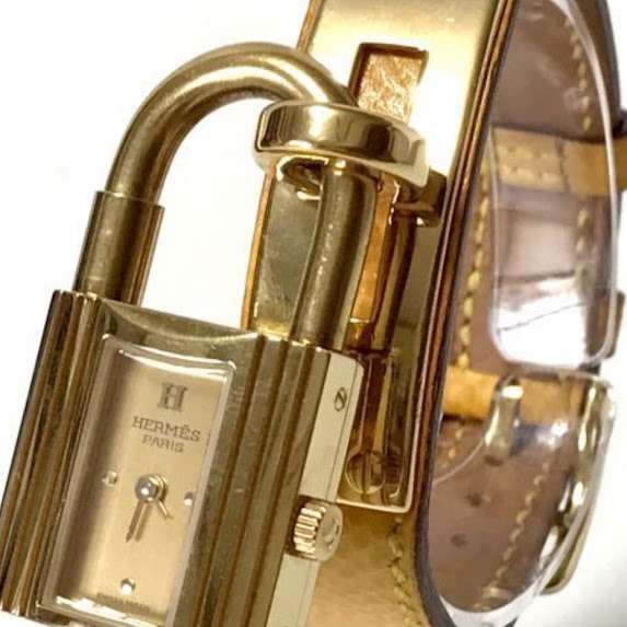 HERMES エルメス ケリーウォッチ 南京錠モチーフ ゴールド文字盤 ゴールド金具 ベルト イエロー系 レディース 腕時計を買い取りました！